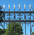 iron gate with golden spears