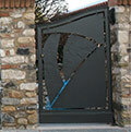 iron gate with decorated sheet metal